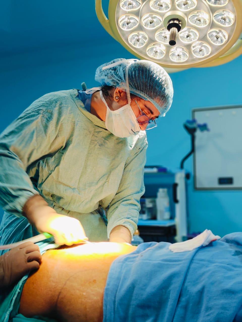 Dr. Maninder Kaur Bedi in operating theatre